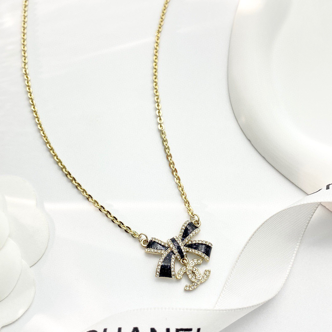 CHANEL シャネル ネックレス リボン 蝶結び エナメル 黒 ステンレス 変色しにくい 上品